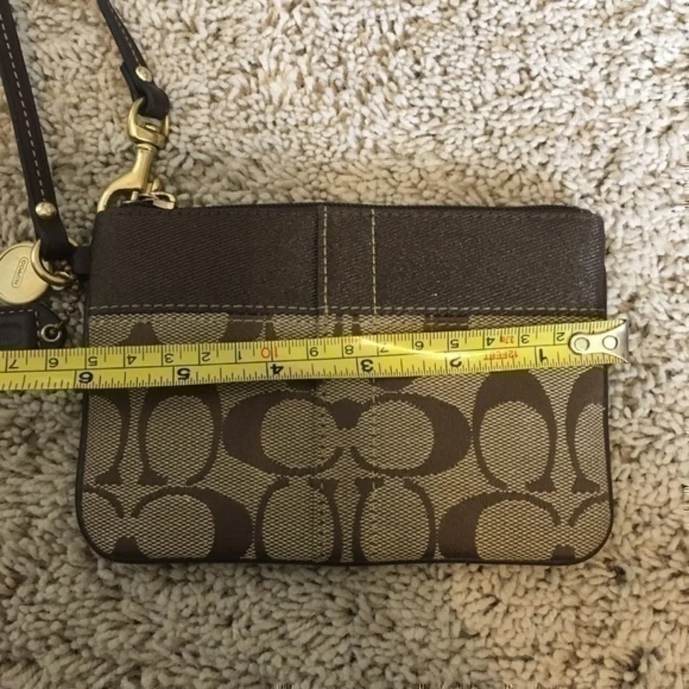 Coach Khaki signature stripe wristlet